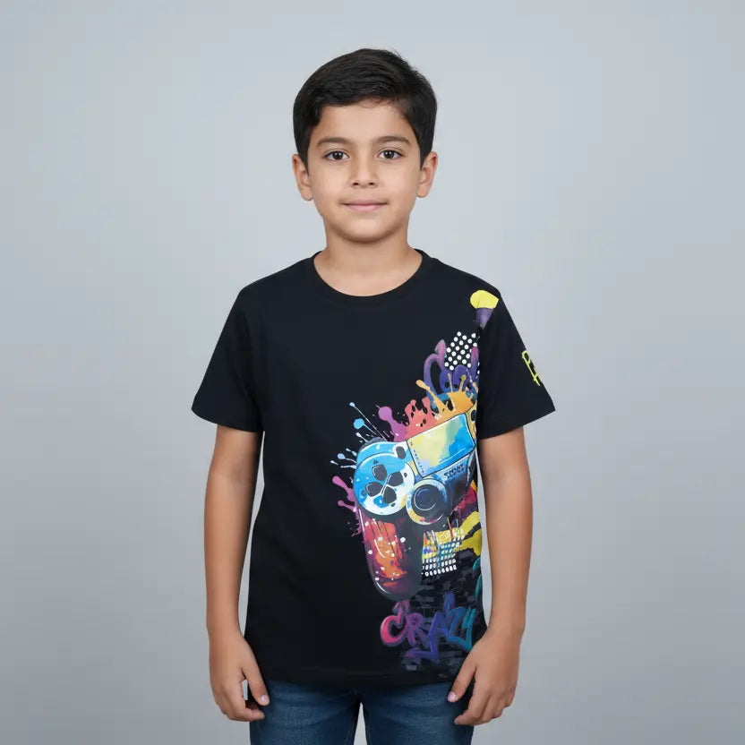 Child wearing a black t-shirt with colorful graphics on a gray background